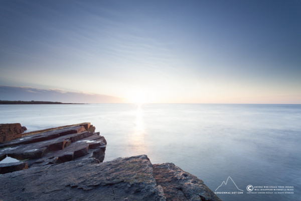 Exposure metered on rocks in front of me. The rocks look great, but the sky is far too bright!